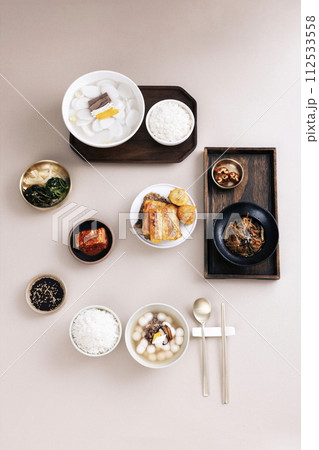 Traditional foods that are eaten in Lunar New Year are placed on a plate Traditional foods that are eaten in Lunar New Year are placed on a plate 112533558