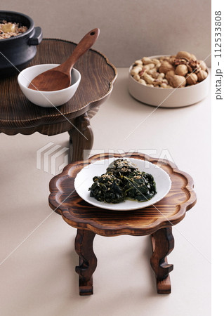 There are five grain rice and herbs at the top of the refreshments, and there is a bowl of peanuts and walnuts at the bottom There are five grain rice and herbs at the top of the refreshments, and there is a bowl of peanuts and walnuts at the bottom 112533808