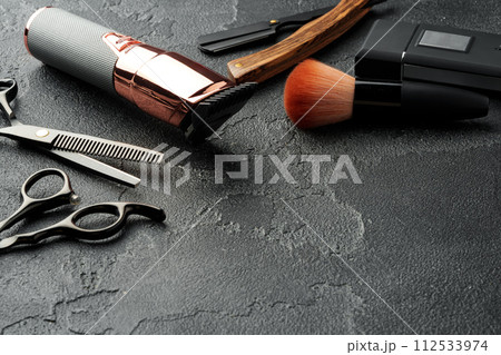 Set of tools for hairdressing and barbershop on gray background Set of tools for hairdressing and barbershop on gray background 112533974
