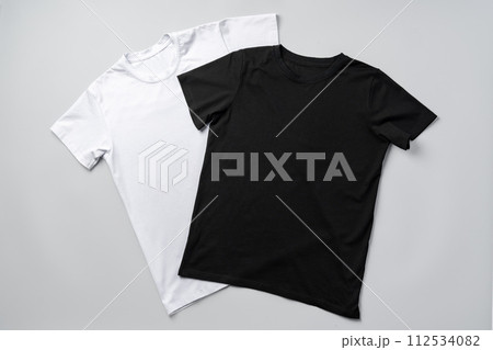 Cotton T-shirt on gray background flat lay top view 112534082