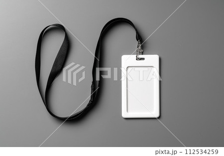 Blank nametag on gray background copy space 112534259