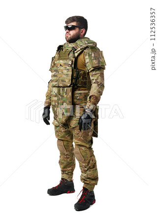 Male soldier in military ammunition isolated on white background Male soldier in military ammunition isolated on white background 112536357
