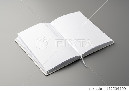 Blank notepad on gray background studio shot Blank notepad on gray background studio shot 112536490