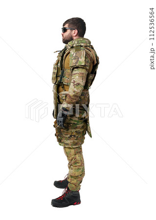 Male soldier in military ammunition isolated on white background Male soldier in military ammunition isolated on white background 112536564