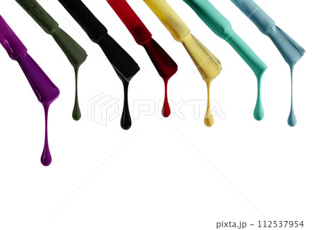 Variety of multicolored nail polish drops flowing from the brush isolated on white background. Set of gel nail polish swatches for design. 112537954