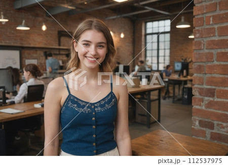 AI-generated content. Young creative woman in casual attire in loft office. Friendly and dynamic workspace atmosphere. 112537975