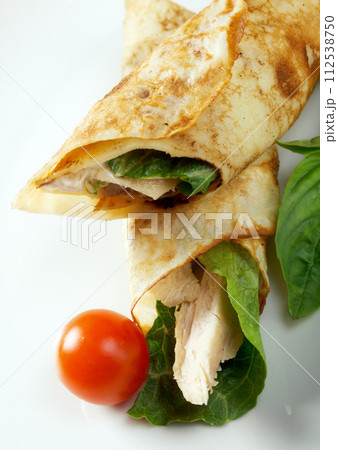 rolled pancakes stuffed chicken rolled pancakes stuffed chicken 112538750