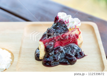 Blueberry cheesecake with cream Blueberry cheesecake with cream 112539672
