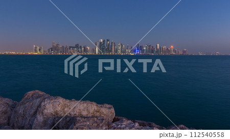 Skyline of Doha night to day transition timelapse in Qatar 112540558
