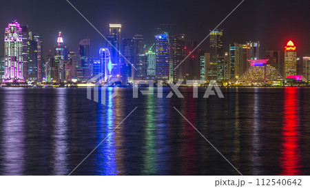Doha skyscrapers in downtown skyline night timelapse, Qatar, Middle East 112540642