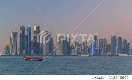 Doha downtown skyline day to night timelapse, Qatar, Middle East Doha downtown skyline day to night timelapse, Qatar, Middle East 112540643
