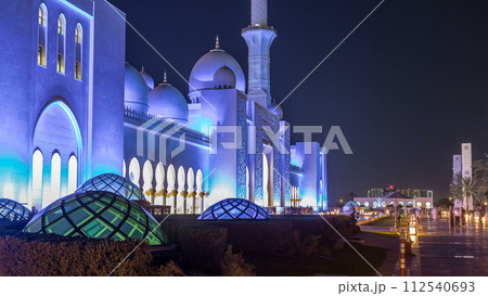Sheikh Zayed Grand Mosque illuminated at night timelapse, Abu Dhabi, UAE. Sheikh Zayed Grand Mosque illuminated at night timelapse, Abu Dhabi, UAE. 112540693