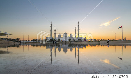 Sheikh Zayed Grand Mosque in Abu Dhabi day to night timelapse after sunset, UAE 112540706