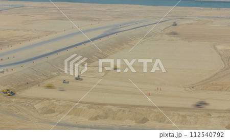 Soil compactor and bulldozer during road construction works timelapse Soil compactor and bulldozer during road construction works timelapse 112540792