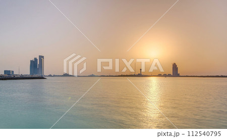 Sunset in Abu Dhabi over Marina Island timelapse Sunset in Abu Dhabi over Marina Island timelapse 112540795