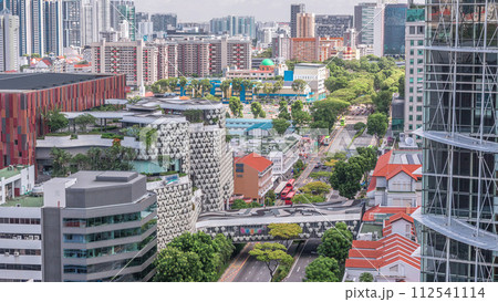 Singapore skyline with Victoria street and National Library aerial timelapse. 112541114
