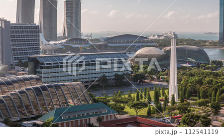 A beautiful morning panorama with Marina Bay area and skyscrapers city skyline aerial timelapse. 112541119