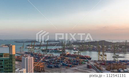 Commercial port of Singapore aerial day to night timelapse. Commercial port of Singapore aerial day to night timelapse. 112541131