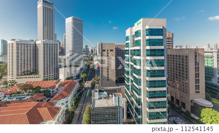 A beautiful morning panorama with Marina Bay area and skyscrapers city skyline aerial timelapse. A beautiful morning panorama with Marina Bay area and skyscrapers city skyline aerial timelapse. 112541145
