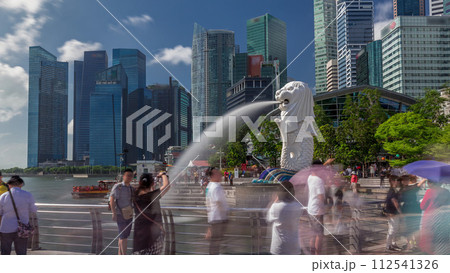 The Merlion fountain and Singapore skyline timelapse hyperlapse. 112541326