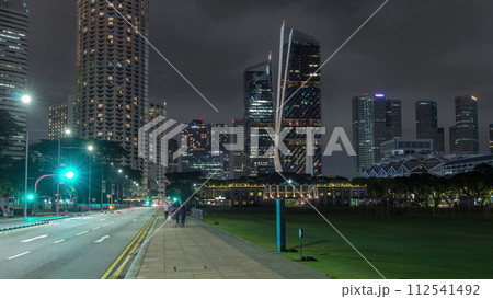 Skyline with Singapore Recreation Club and skyscrapers on background night timelapse hyperlapse 112541492