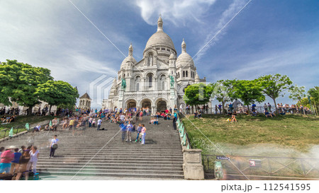 Tourists near the Basilica of the Sacra-Coeur church timelapse hyperlapse. 112541595