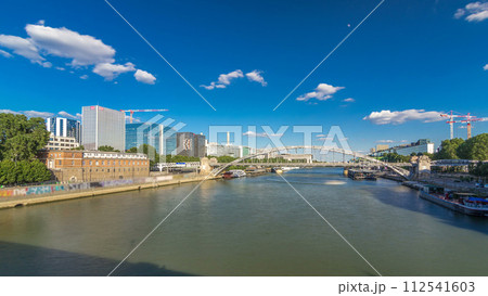 The Austerlitz viaduct in Paris timelapse hyperlapse, seen from bank of the river Seine with a metro train passing The Austerlitz viaduct in Paris timelapse hyperlapse, seen from bank of the river Seine with a metro train passing 112541603