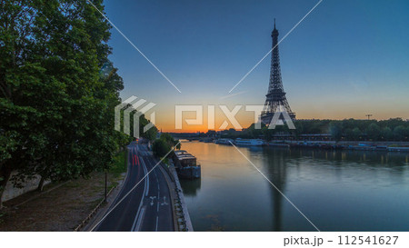 Eiffel Tower and the Seine river at Sunrise timelapse, Paris, France 112541627