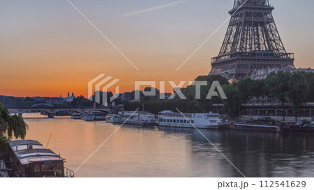 Eiffel Tower and the Seine river at Sunrise timelapse, Paris, France Eiffel Tower and the Seine river at Sunrise timelapse, Paris, France 112541629