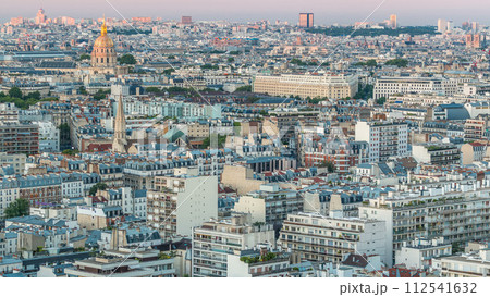 Aerial panorama above houses rooftops in a Paris day to night timelapse 112541632