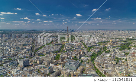 Aerial view from Montparnasse tower with Eiffel tower and La Defense district on background timelapse in Paris, France. 112541811