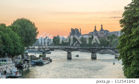 View to Pont des Arts in Paris after sunset day to night timelapse, France 112541842
