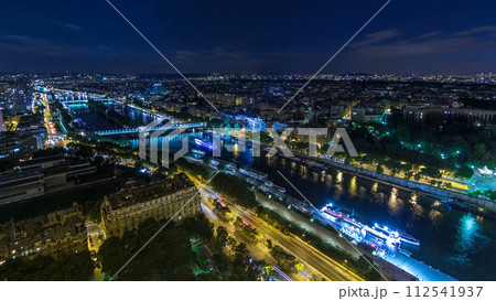 Aerial night timelapse view of Paris City and Seine river shot on the top of Eiffel Tower Aerial night timelapse view of Paris City and Seine river shot on the top of Eiffel Tower 112541937