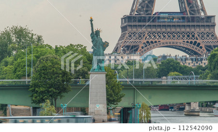 The Statue of Liberty and the Eiffel Tower Timelapse. Paris, France The Statue of Liberty and the Eiffel Tower Timelapse. Paris, France 112542090