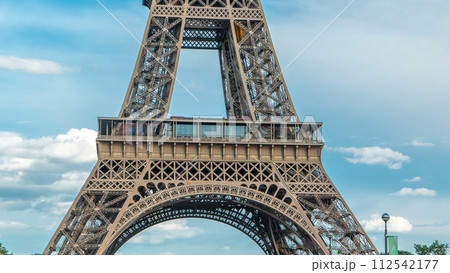 Close up view of first section of the Eiffel Tower timelapse in Paris, France. Close up view of first section of the Eiffel Tower timelapse in Paris, France. 112542177