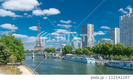 Eiffel tower at the river Seine timelapse from bridge in Paris, France Eiffel tower at the river Seine timelapse from bridge in Paris, France 112542207