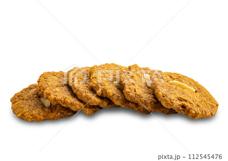 High angle view pile of crispy delicious coconut cookies. High angle view pile of crispy delicious coconut cookies. 112545476