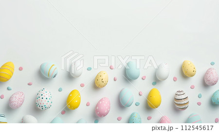 Easter greeting card with copy space. Painted eggs in pastel colors, top view. Generative AI 112545617