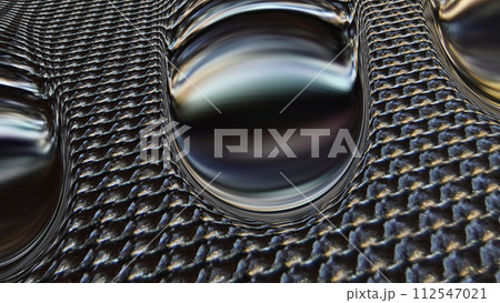 Sliding drops in techno style.A drop of liquid similar to mercury flows down the ribbed surface. Abstraction. Sliding drops in techno style.A drop of liquid similar to mercury flows down the ribbed surface. Abstraction. 112547021