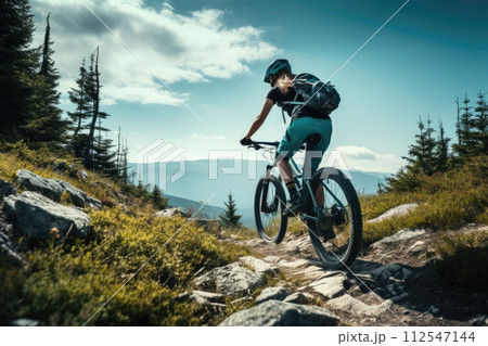 Mountain biking woman riding on bike in summer mountains forest landscape. Generative AI 112547144