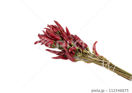Bunch of chili pepper pods on white background. 112548875