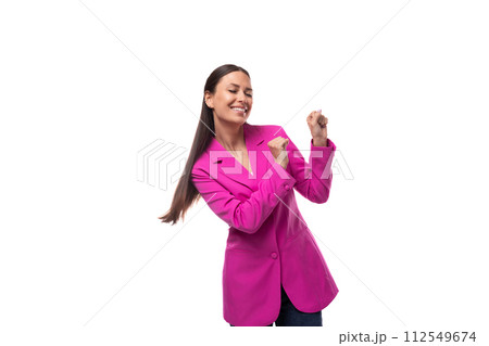 a young slender office worker woman with black hair dressed in a crimson jacket is dancing 112549674