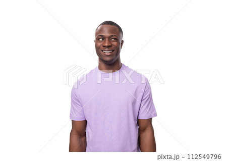 young adorable african man with short haircut wearing lilac t-shirt young adorable african man with short haircut wearing lilac t-shirt 112549796