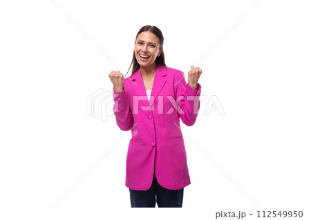 young slender well-groomed brunette business woman dressed in a crimson chic suit 112549950