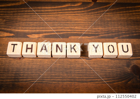 Thank You in English. Alphabet blocks on wood texture background 112550402