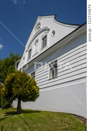 White historical house, Dlouhomilov, Czechia 112550674