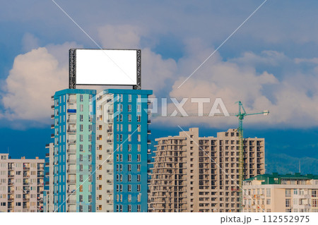 Mock up: blank white billboard or large display on the roof, residental building Mock up: blank white billboard or large display on the roof, residental building 112552975