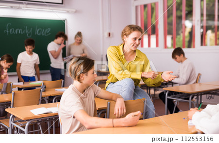 Teenagers during recess in school Teenagers during recess in school 112553156