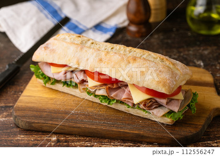 submarine sandwich with turkey and black forest ham 112556247