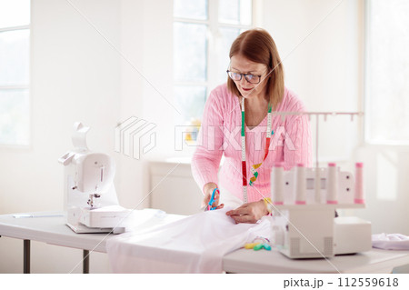 Sewing machine. Fashion design workshop. 112559618